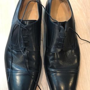 One pair of men’s dress shoes